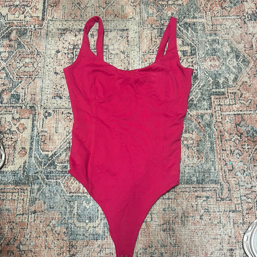 Pink bodysuit